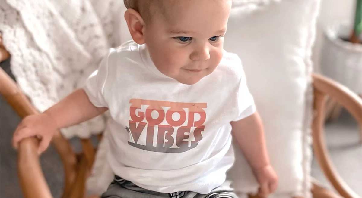 Baby Wearing Good Vibes T shirt from Bespoke Baby